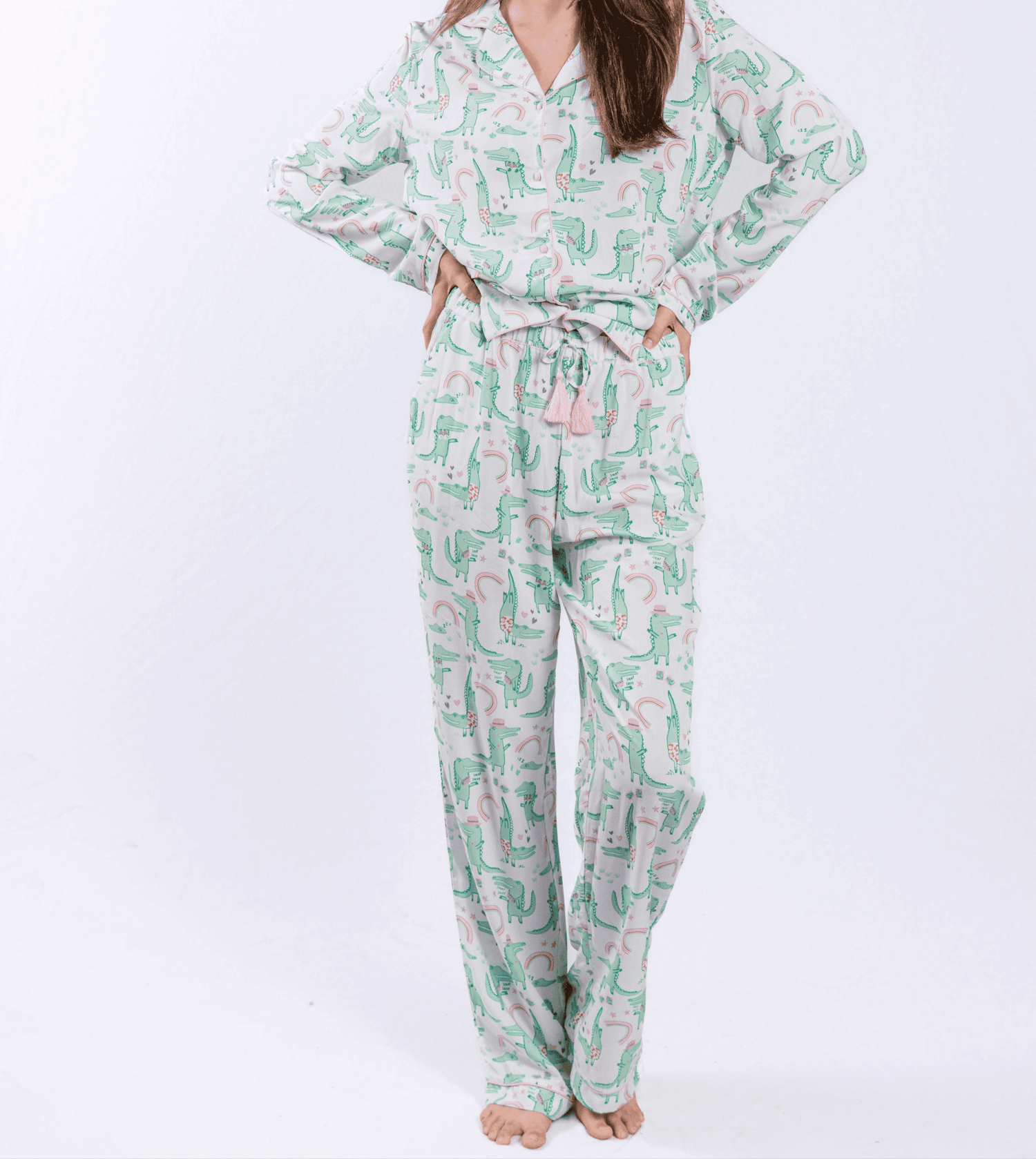 Alligator print pajama set with button-down shirt and pants.