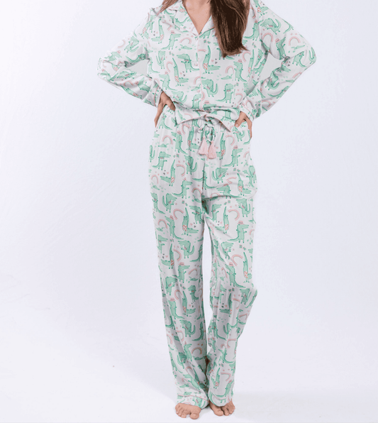 Alligator print pajama set with button-down shirt and pants.
