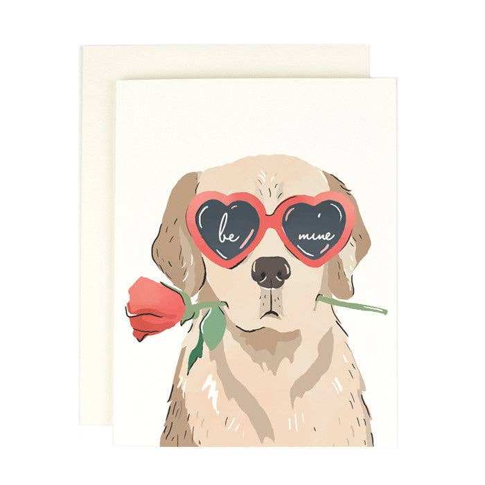 Be Mine Heart Eye Pup card with dog wearing heart-shaped sunglasses and holding a rose.