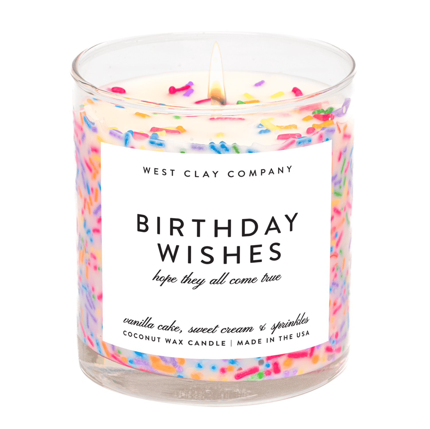 Vanilla scented birthday wishes candle with rainbow sprinkles in a clear glass vessel.