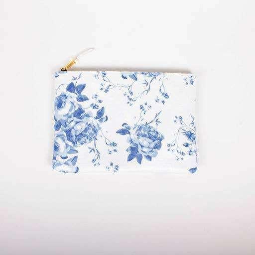 Blue Rose Terry Flat Pouch with floral design and gold zipper.