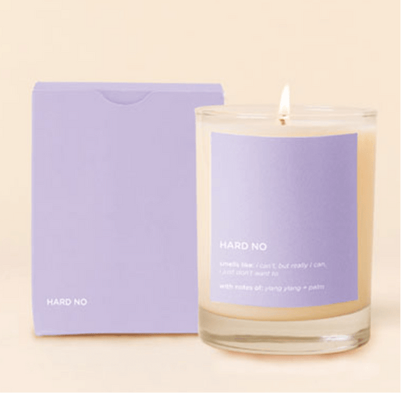 Candle Rocks Glass with "Hard No" label, soy wax candle, purple packaging.