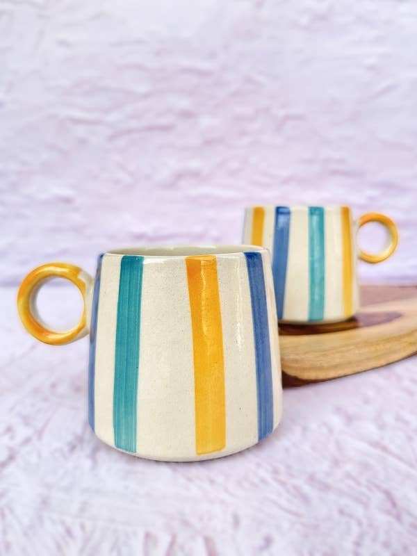 Casa Amarosa ceramic mug with bright stripes, 450ml capacity.