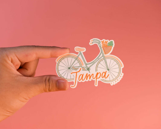 Cute Tampa bike sticker featuring a bicycle design, ideal for laptops and water bottles.
