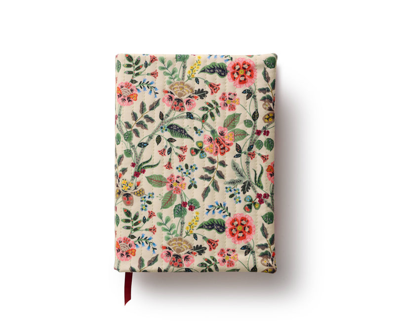 Floral patterned notebook on a white background