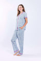 Dutch Lily print pajamas set with short sleeve button down top and pants, featuring cotton lace trim and Swiss Dot textured fabric.