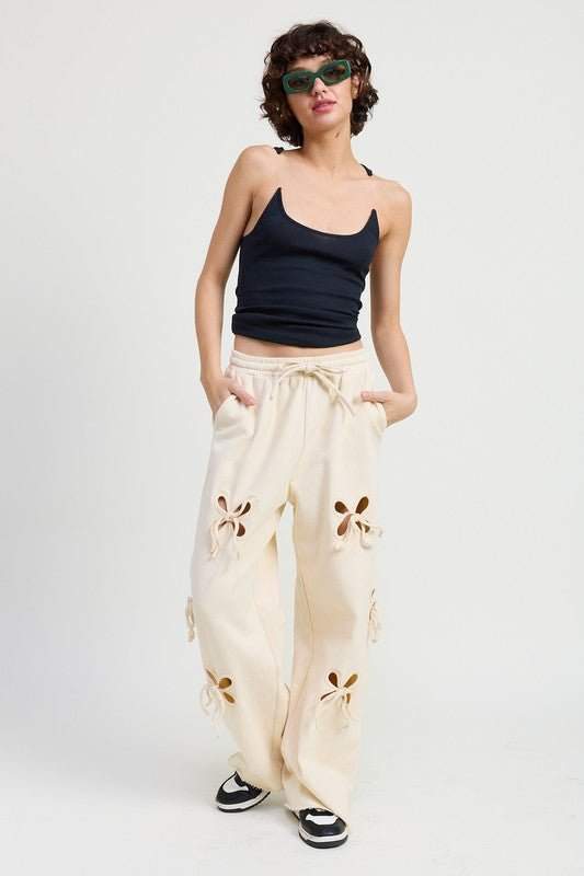 Emory park French terry pants with cutout detail in 100% cotton, model wearing size small.