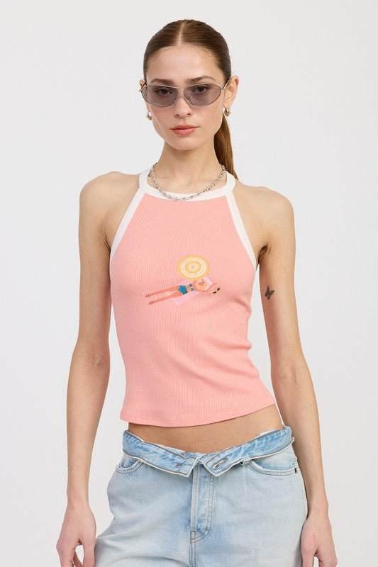 Emory Park racer back graphic tank top in pink with front design, worn by model.