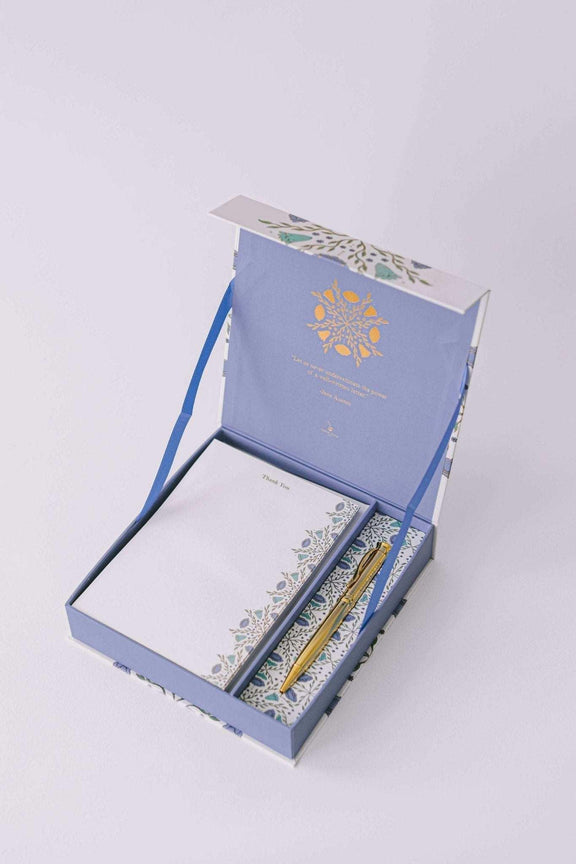 Folk Pattern Luxury Stationery Set with gold-foiled box, writing sheets, envelopes, sealing stickers, and pen.