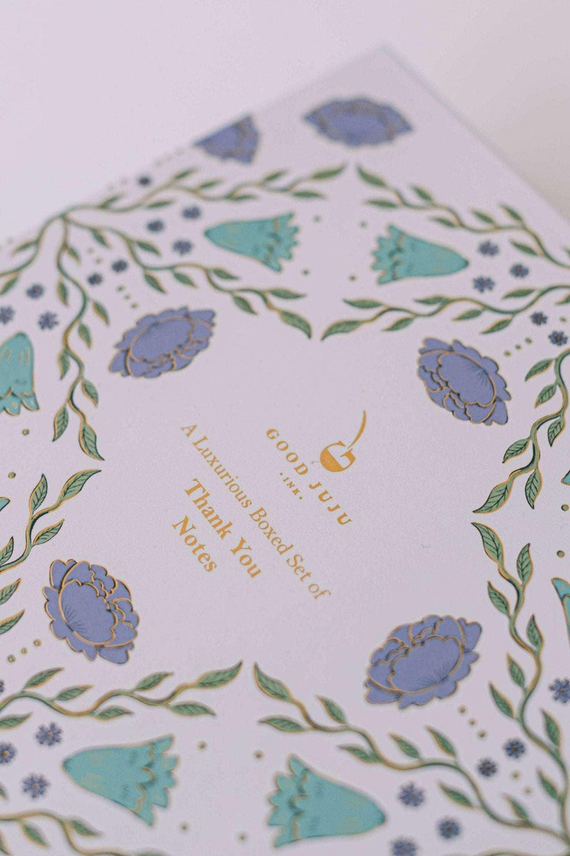 Folk Pattern Luxury Stationery Set in green and blue design on keepsake box with gold-foiled details.