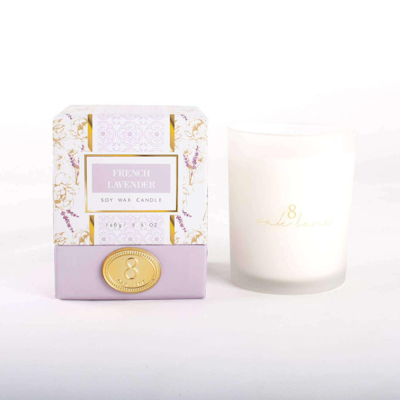 French Lavender 5.6oz Soy Wax Candle in frosted glass with floral packaging.