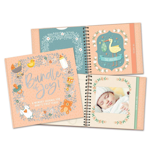 Guided journal for baby memories with illustrations and photo pages.
