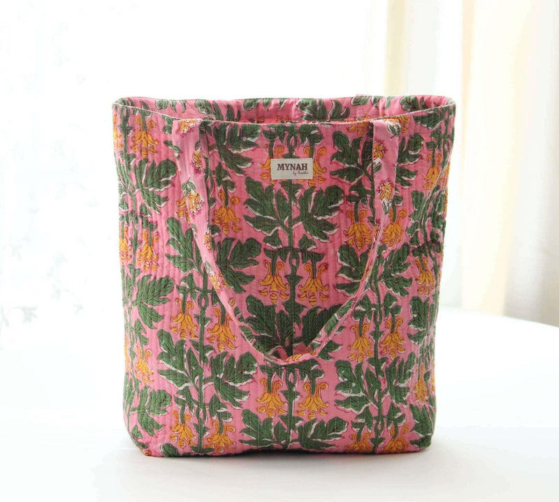 Handmade Bubblegum Forest floral print reversible tote bag with quilted design.