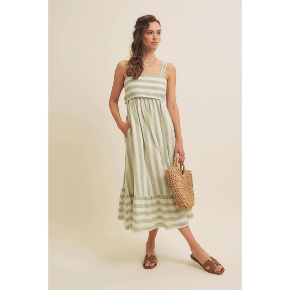 Stripe MIDI Dress with ribbon tie, sleeveless design, worn by model.