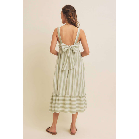 Stripe MIDI dress with ribbon tie, sleeveless and lined, made of polyester and cotton.