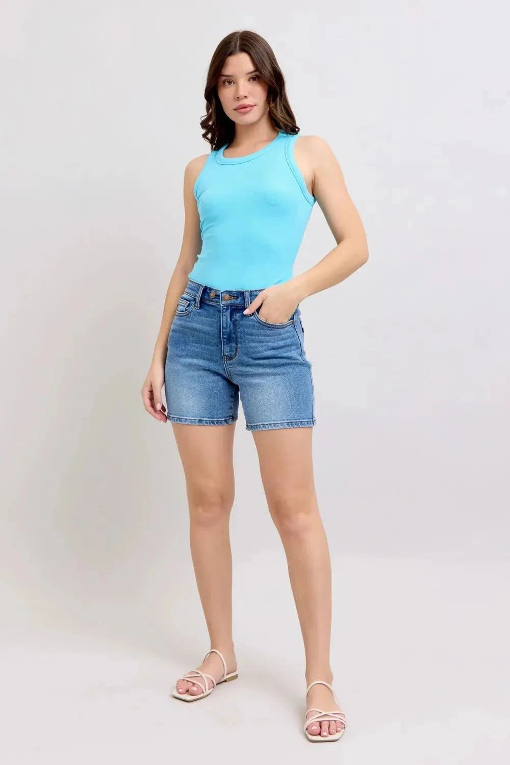 Judy Blue Size 2 Button Denim Shorts with Pockets worn by model.