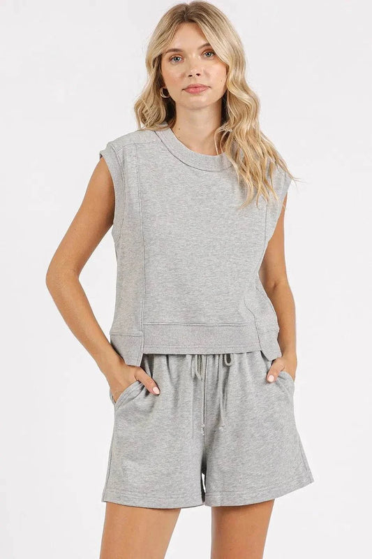 French Terry crew neck top and shorts set in gray with pockets and drawstring.