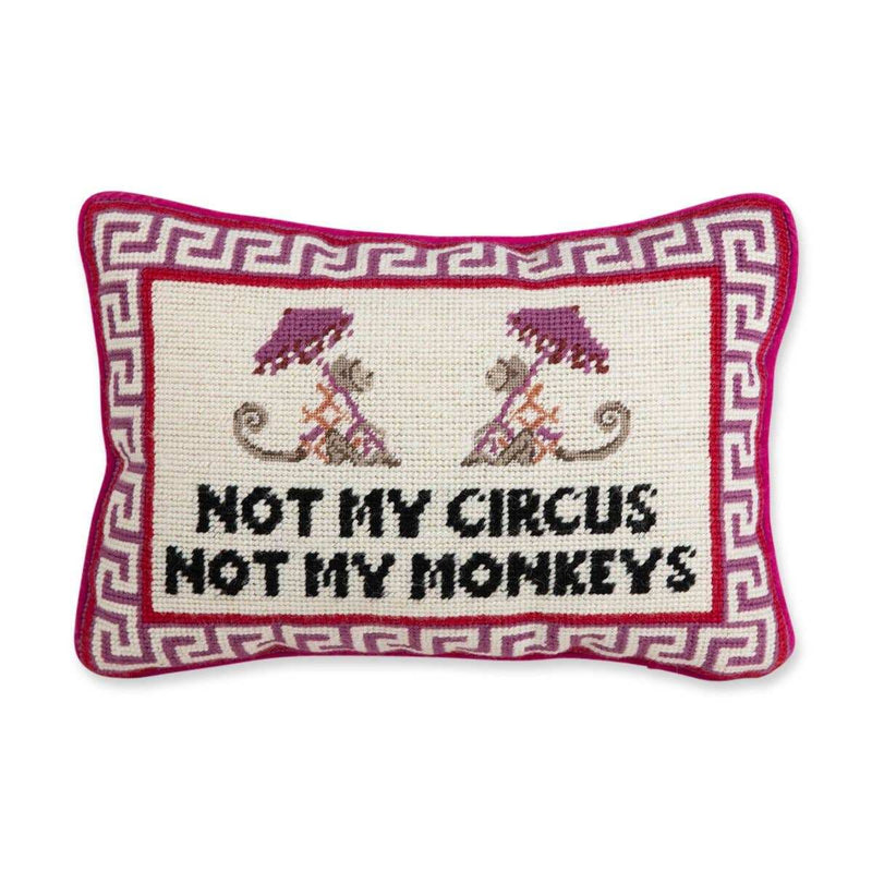 Needlepoint pillow with "Not My Circus" message, hot pink velvet backing, and embroidered design.