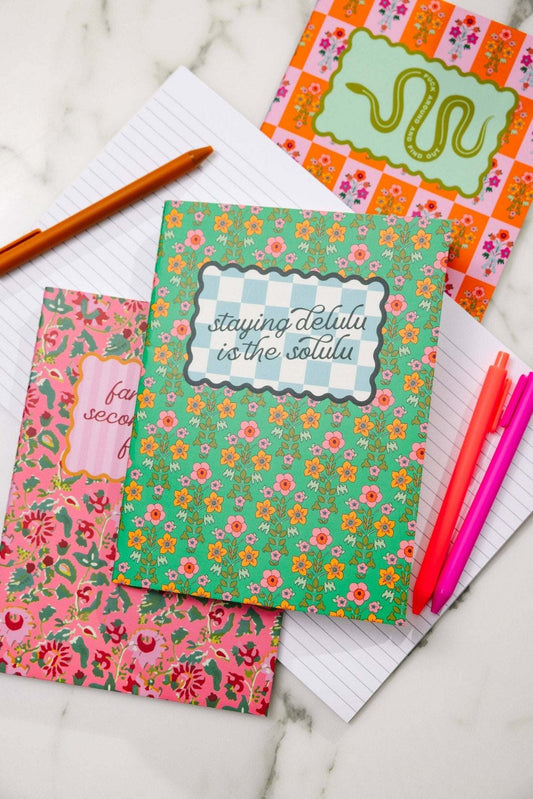 Delulu Notebook with floral cover for notes and doodles.