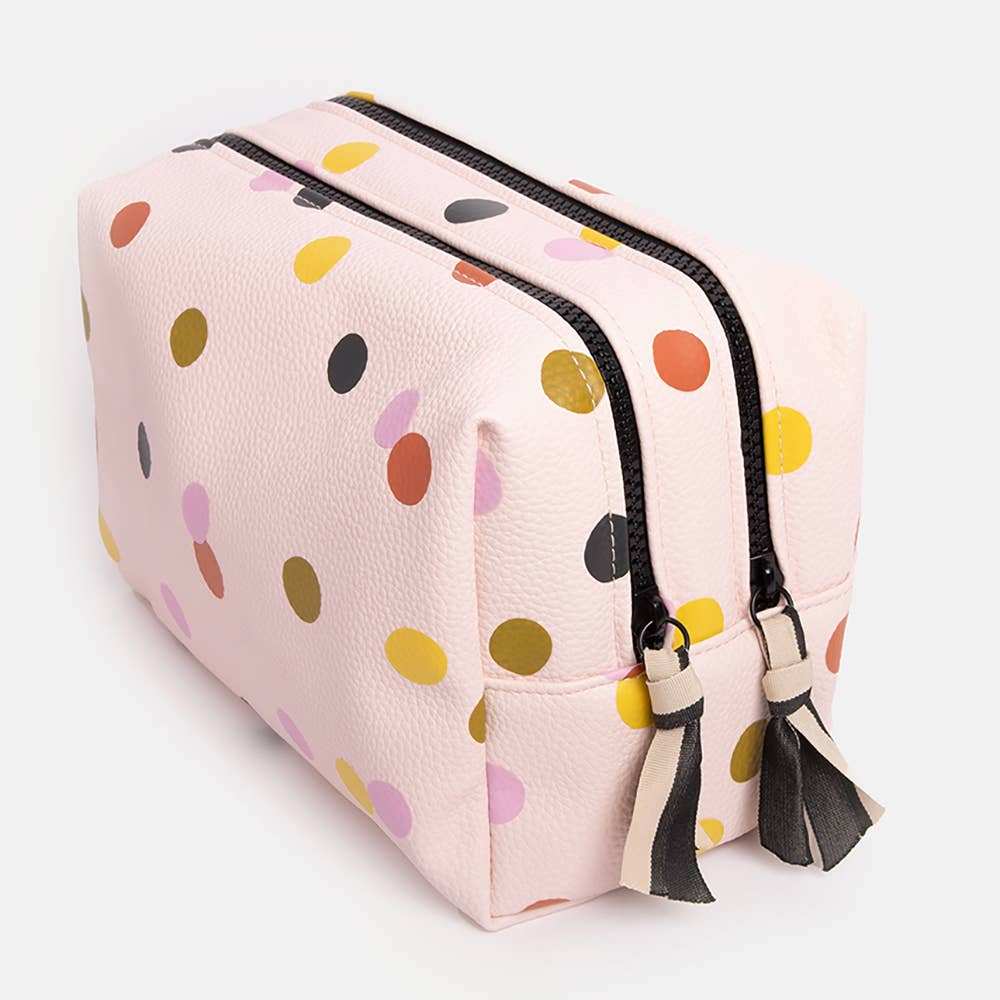 Pale pink dotty large travel washbag with handle and gold zip.