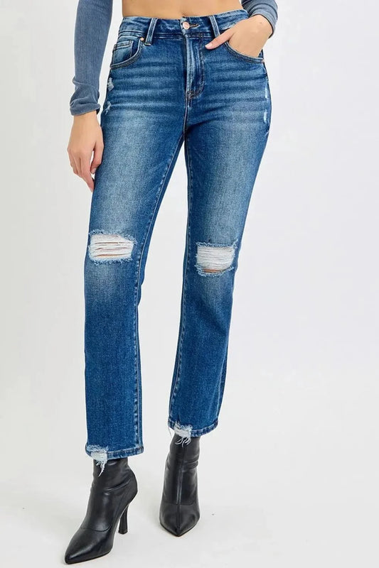 High Rise Distressed Crop Jeans with raw hem and pocket detail.