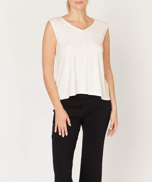 Studio Ko Bamboo Reversible Tank with V-neckline, white, worn by a model.