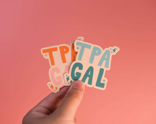Tampa Gal Sticker held against a pink background, ideal for decorating laptops and water bottles.