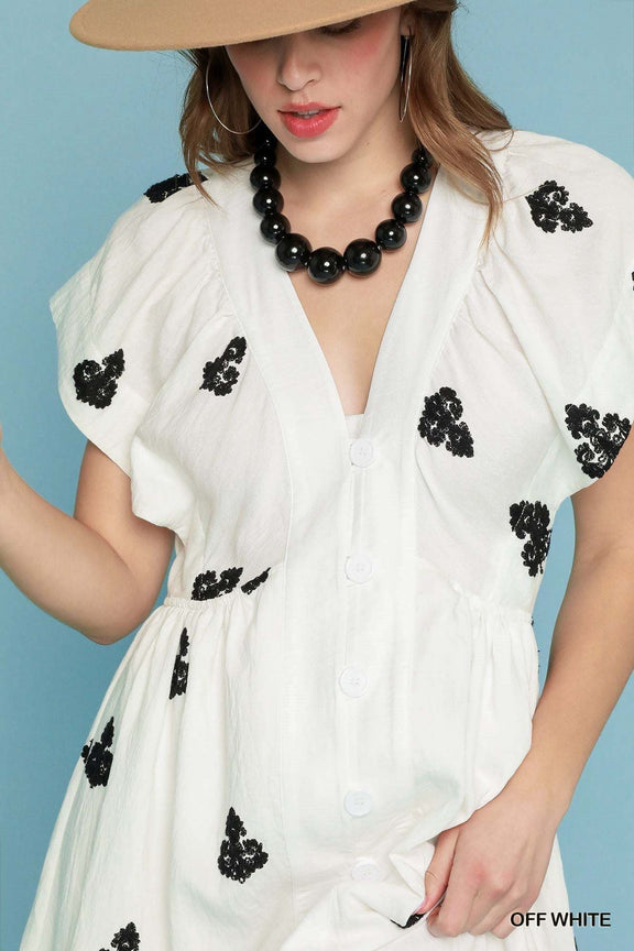 Umgee embroidered V-neck midi dress, dolman sleeves, off-white with black accents.