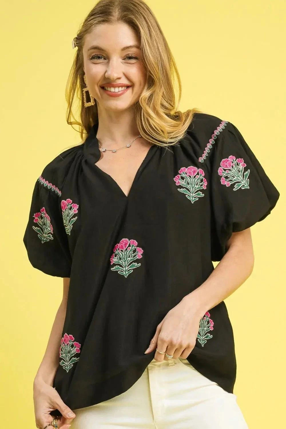 Umgee Floral Embroidered Puff Sleeve Blouse with V-neckline and pink carnation motifs.