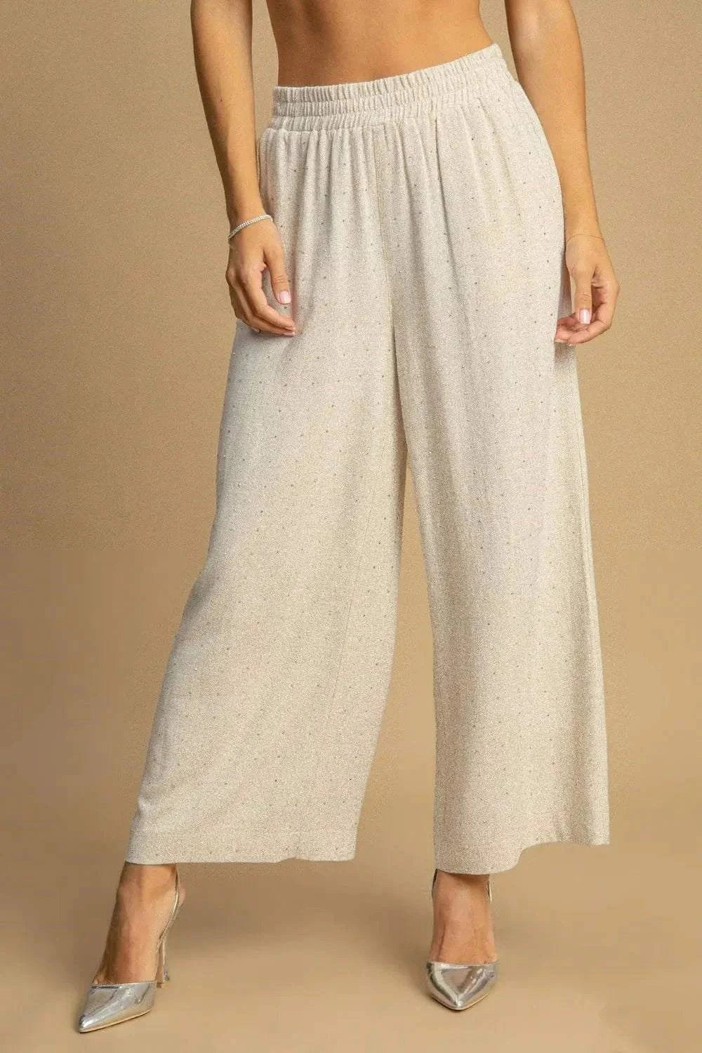 Umgee high waisted embellished linen pants with rhinestones, featuring a flattering silhouette.