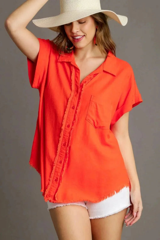 Umgee linen blend button-down shirt with short folded sleeves in vibrant orange.