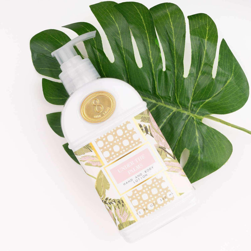 Under the Palms 300ml Hand & Body Lotion with botanical print and nourishing shea butter.