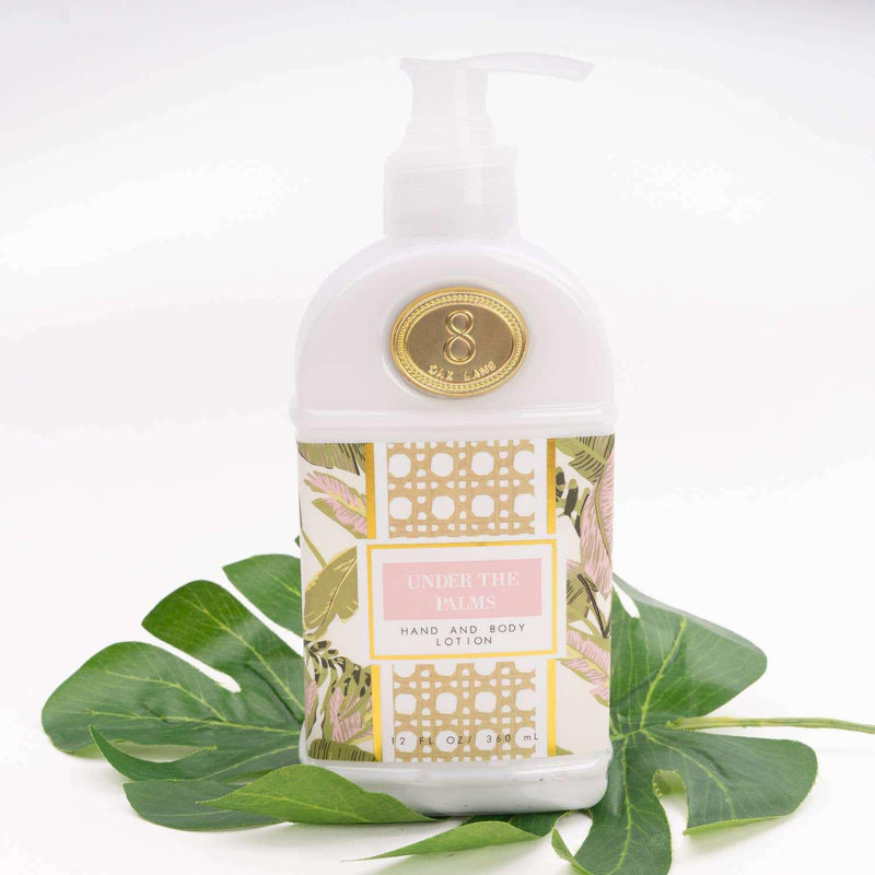 Under the Palms 300ml Hand & Body Lotion with botanical print background.