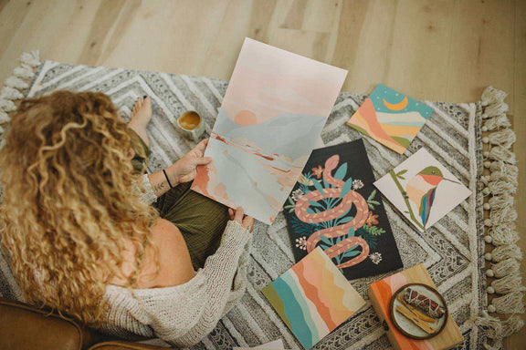 Vibrant Butterflies Meditative Art Paint by Number Kit with poster and paints on a decorative rug.